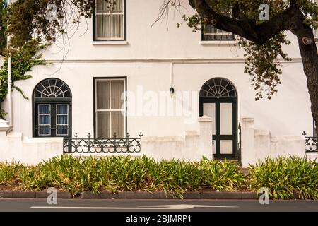 South Africa; Stellenbosch; Dorp Street. fanlights above doors of white painted historic houses Stock Photo