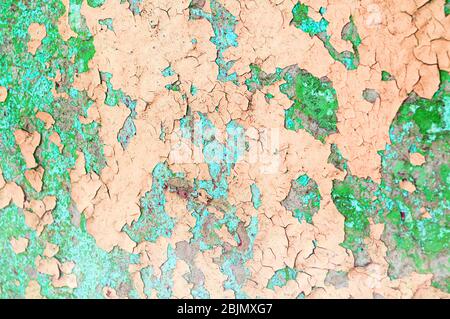 Texture concrete industrial background - light yellow and green peeling paint on the old rough concrete surface, peeling paint texture Stock Photo