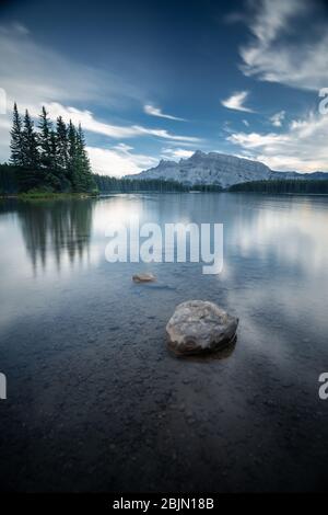 Pine tree island in Two Jack Lake, Banff National Park, Canadian Rockies, Alberta, Canada Stock Photo
