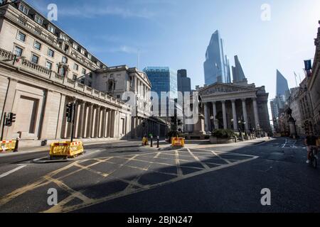 A completely abandoned Bank of England and Royal Exchange early this morning in the heart of the City of London during the coronavirus lockdown, UK