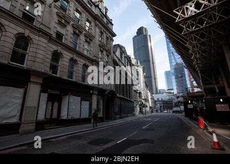 A completely abandoned street scene in the early morning in the heart of the City of London during the coronavirus lockdown, UK Stock Photo