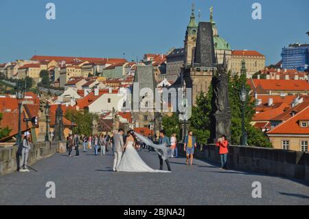 A married couple on a Prague bridge Stock Photo