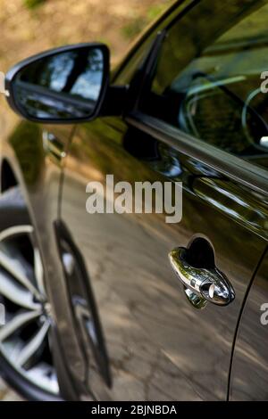 Car's door with keyless system. Use wallpapers or backgrounds to transport vehicles and cars or car images Stock Photo