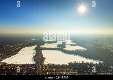 frozen lakes Wildfoerstersee, Haubachsee, Boelltersee, Wambachsee und Masurensee in Duisburg-Sued in winter, 26.01.2017, aerial view, Germany, North Rhine-Westphalia, Ruhr Area, Duisburg Stock Photo