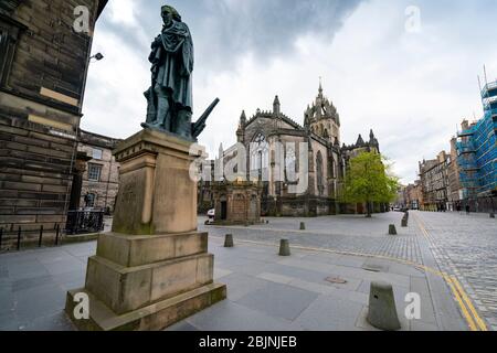 View of statue of Adam Smith on the Royal Mile during covid-19 lockdown in Edinburgh Old Town, Scotland, UK Stock Photo