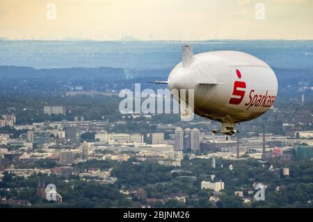 , Blimp with Sparkassen - Promotion as airship in flight over Herne, 07.08.2016, aerial view, Germany, North Rhine-Westphalia, Ruhr Area, Herne Stock Photo