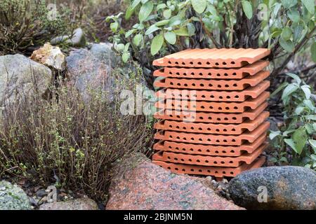 nesting aid for wild bees, interlocking pantiles, Germany Stock Photo