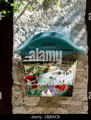 Decorated postbox in the medieval town of Saint Paul de Vence,  Cote d'Azur, Provence, France. Stock Photo