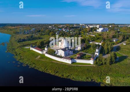 Staritsky Holy Assumption Monastery in the cityscape on a sunny August day (aerial photography). Staritsa, Russia Stock Photo