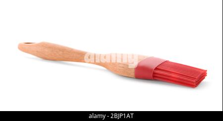 Silicone brush with wooden handle on white background Stock Photo