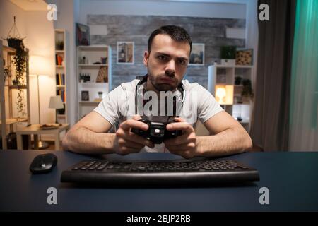 Man Streaming Multiplayer Online First Person Shooter on Pc while Gaming  Girl is Fighting in Virtual Reality Game Stock Photo - Image of headphones,  stream: 259471122