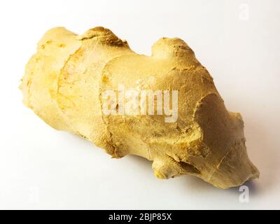 A single thumb of ginger on a white background Stock Photo