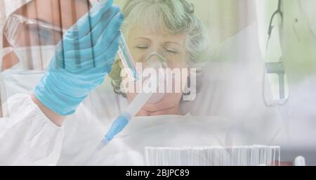 Digital illustration of senior female patient lying on a hospital bed over a scientist wearing coron Stock Photo
