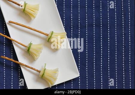 Snack Cheese and Salt Sticks Broomsticks on Plate Stock Photo