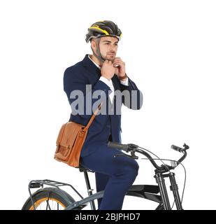 Young handsome businessman with bicycle on white background Stock Photo
