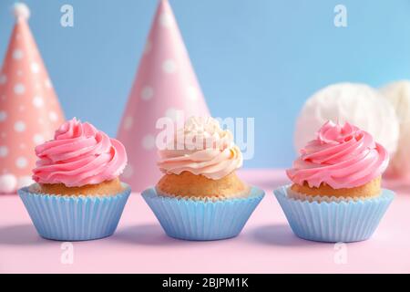 Yummy cupcakes on table Stock Photo