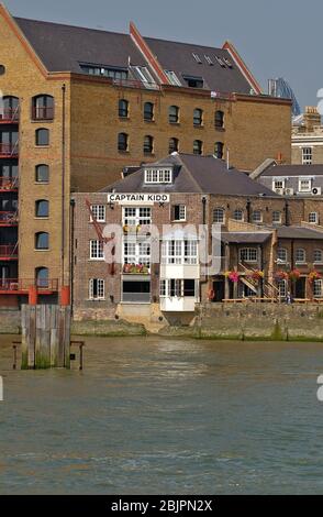 The Captain Kidd riverside pub on the River Thames in Wapping, East London,is named after the 17thC pirate William Kidd,  London, England Stock Photo