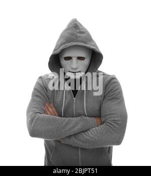 Hacker with anonymous mask with arms crossed, red and blue background ...