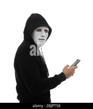 Hacker with phone on white background Stock Photo