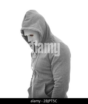 Hacker in mask on white background Stock Photo