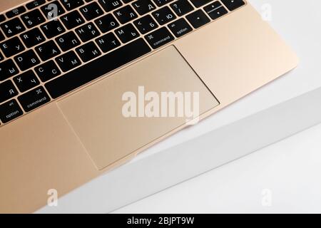 KIEV, UKRAINE - OCTOBER 12, 2017: Apple gold MacBook on box Stock Photo