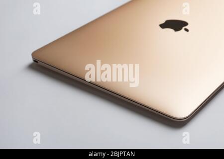 KIEV, UKRAINE - OCTOBER 12, 2017: Apple gold MacBook on light background Stock Photo