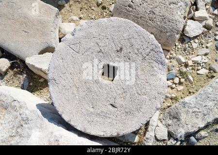 A circular column fragment among the ruins of the ancient Roman city of Amathus, Cyprus. Stock Photo
