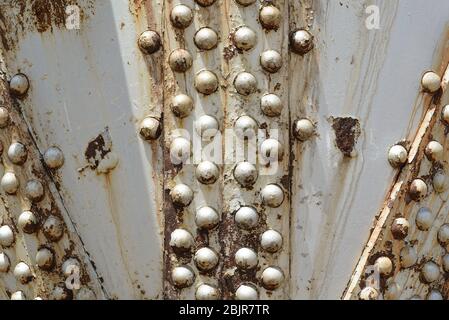 Close-up of an old, riveted, industrial storage tank Stock Photo