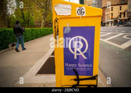 A  distribution box in Chelsea in New York for pamphlets from the Japanese religion Happy Science on Monday, April  20, 2020. (© Richard B. Levine) Stock Photo