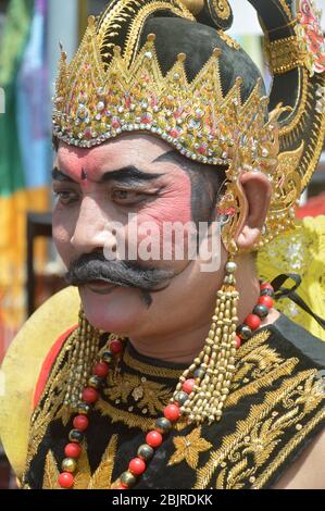TARAKAN - INDONESIA, 25th July 2018 : portrait of Indonesian Javanese man dressed in a puppet character Stock Photo