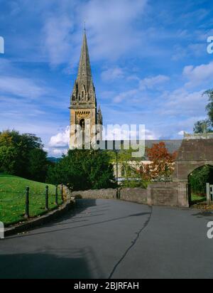 View N of the Cathedral Church of St Teilo, Llandaff, Wales, UK, showing the lychgate (R) & the SW tower & spire rebuilt/restored in the mid C19th. Stock Photo
