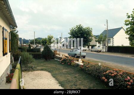 Two Peugeot cars and a Citroen DS Steamer parked by the side of the D19 main road into St Cast Le Guildo, Brittany, France 1974. Stock Photo