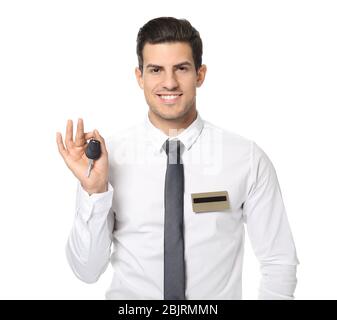 Salesman in formal clothes holding car key on white background Stock ...