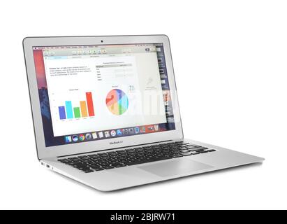KYIV, UKRAINE - NOVEMBER 13, 2017: Apple MacBook Air Silver displaying opened document on white background, designed and developed by Apple Inc Stock Photo