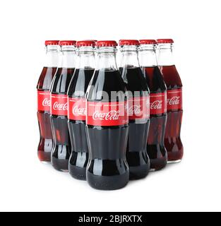 KYIV, UKRAINE - NOVEMBER 13, 2017: Many bottles of Coca-Cola on white background Stock Photo