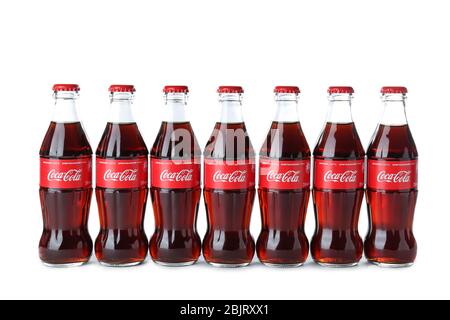 KYIV, UKRAINE - NOVEMBER 13, 2017: Many bottles of Coca-Cola on white background Stock Photo