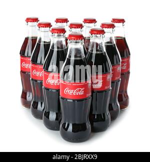 KYIV, UKRAINE - NOVEMBER 13, 2017: Many bottles of Coca-Cola on white background Stock Photo