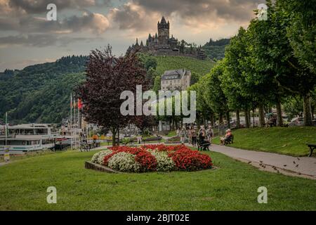 Castle Reichsburg sits above the medieval town of Cochem on the Mosel River, Germany. Stock Photo