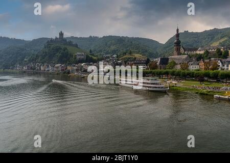 Castle Reichsburg sits above the medieval town of Cochem on the Mosel River, Germany. Stock Photo