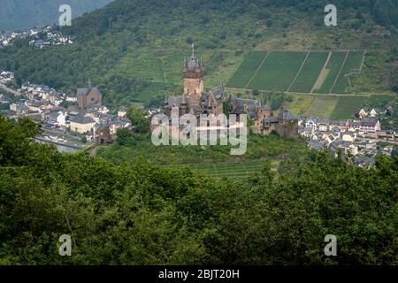 Castle Reichsburg sits above the medieval town of Cochem on the Mosel River, Germany. Stock Photo