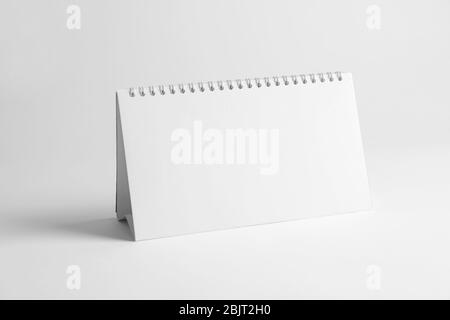 Blank desk calendar on white background. Mockup for design Stock Photo
