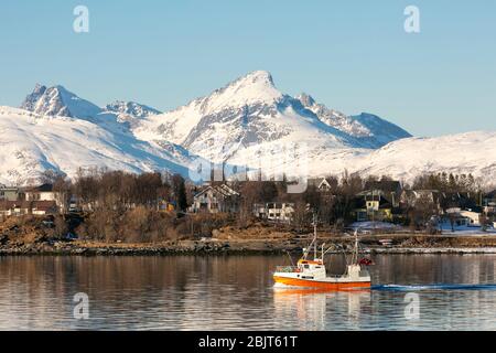 Boat on the water with mountains behind, Tromsø, Norway Stock Photo
