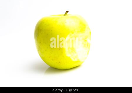 bitten green apple on a white background. close up Stock Photo