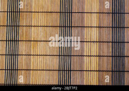 Texture of bamboo mat brown with black Stock Photo