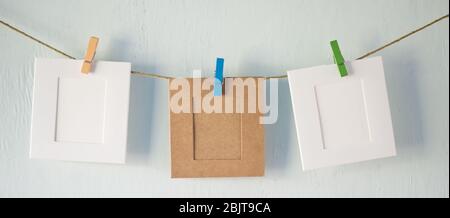 Two photo frames on a rope Stock Photo