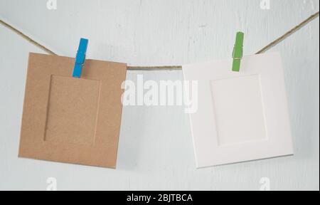 Two photo frames on a rope Stock Photo
