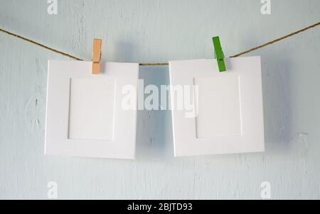 Two photo frames on a rope Stock Photo