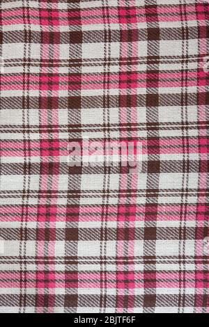 realistic brown pink checkered woolen plaid, background Stock Photo