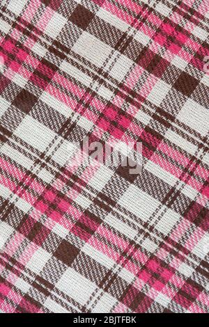 realistic brown pink checkered woolen plaid, background Stock Photo