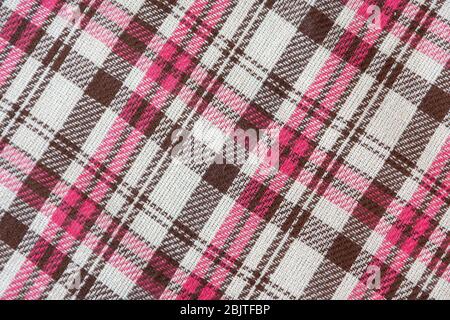 realistic brown pink checkered woolen plaid, background Stock Photo